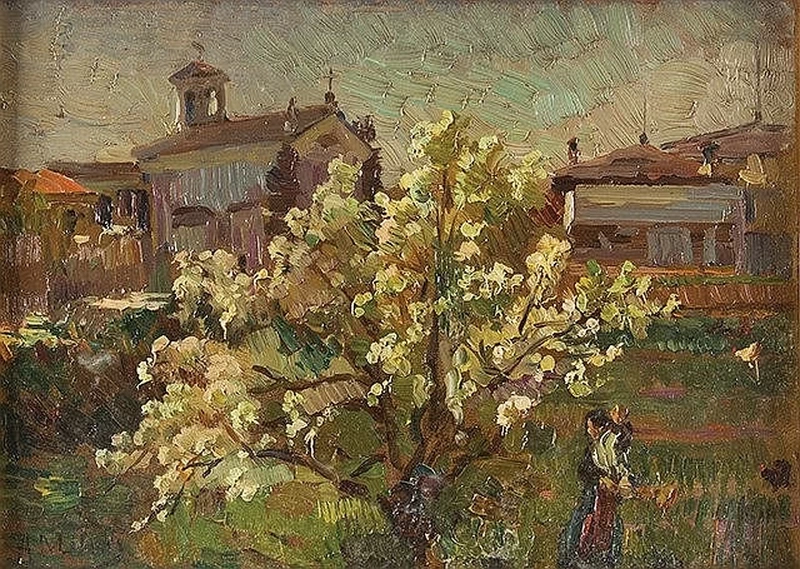 Ciliegio in fiore con paese sullo sfondo